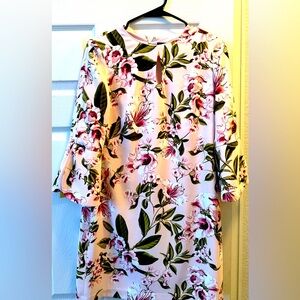 Beautiful carnation pink. 3/4 sleeves. Knee length.